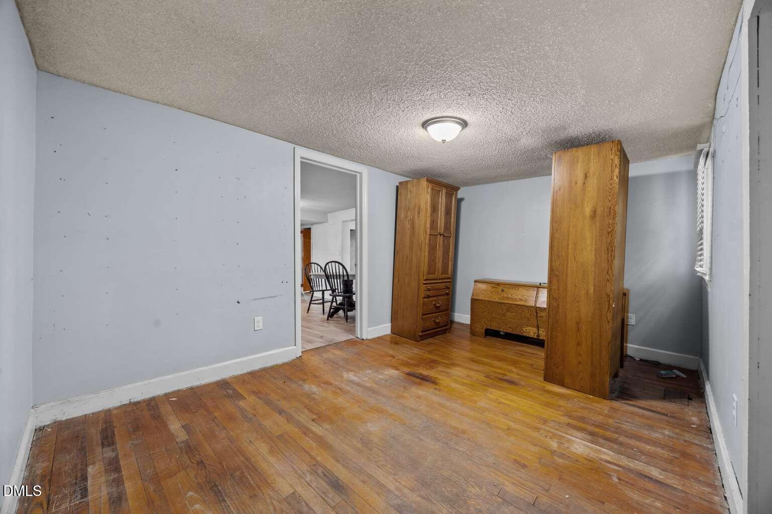 2821 Old Fairground Road Angier, NC 27501 - Photo 18 of 32 a view of a livingroom with a staircase