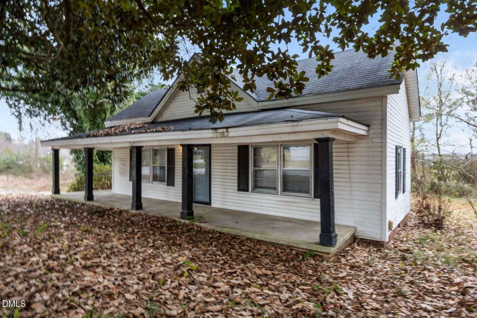 2821 Old Fairground Road Angier, NC 27501 - Photo 23 of 32 a front view of a house with a garden