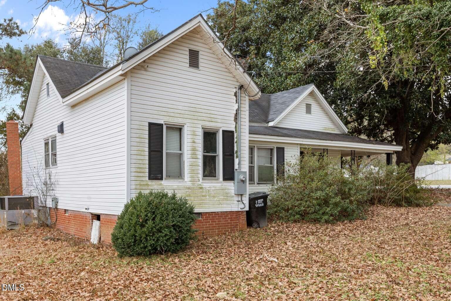 2821 Old Fairground Road Angier, NC 27501 - Photo 26 of 32 a front view of a house with garden