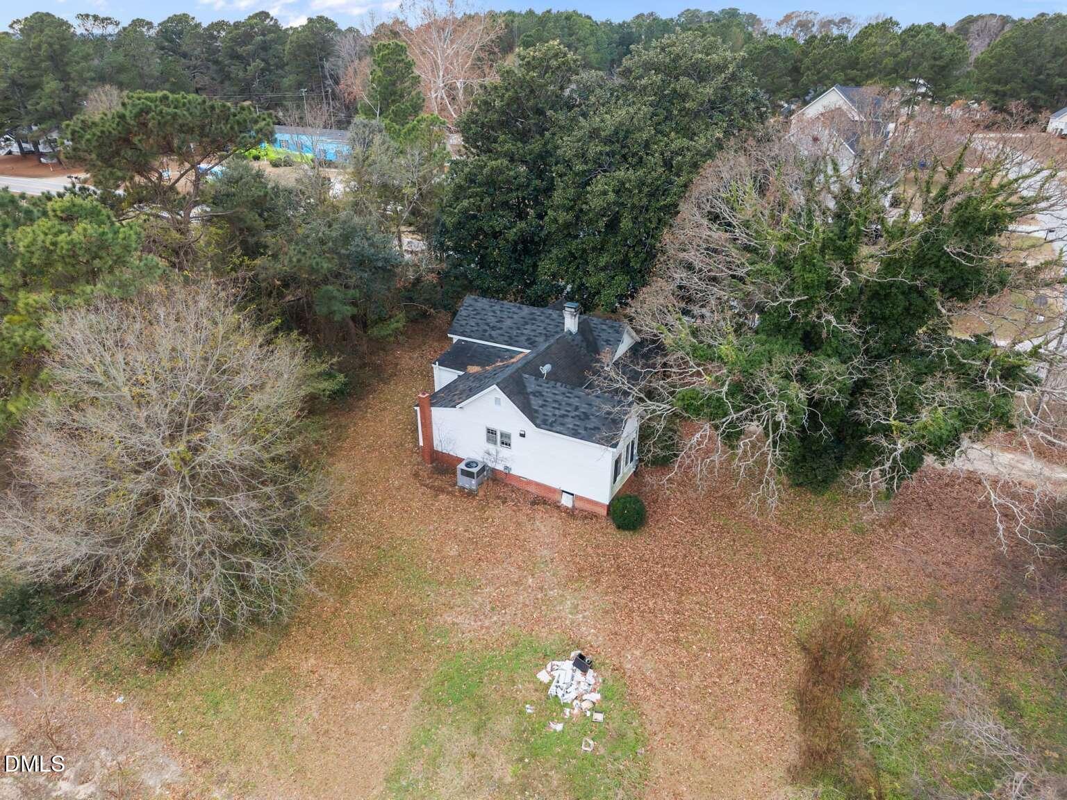 2821 Old Fairground Road Angier, NC 27501 - Photo 29 of 32 an aerial view of a house with a yard