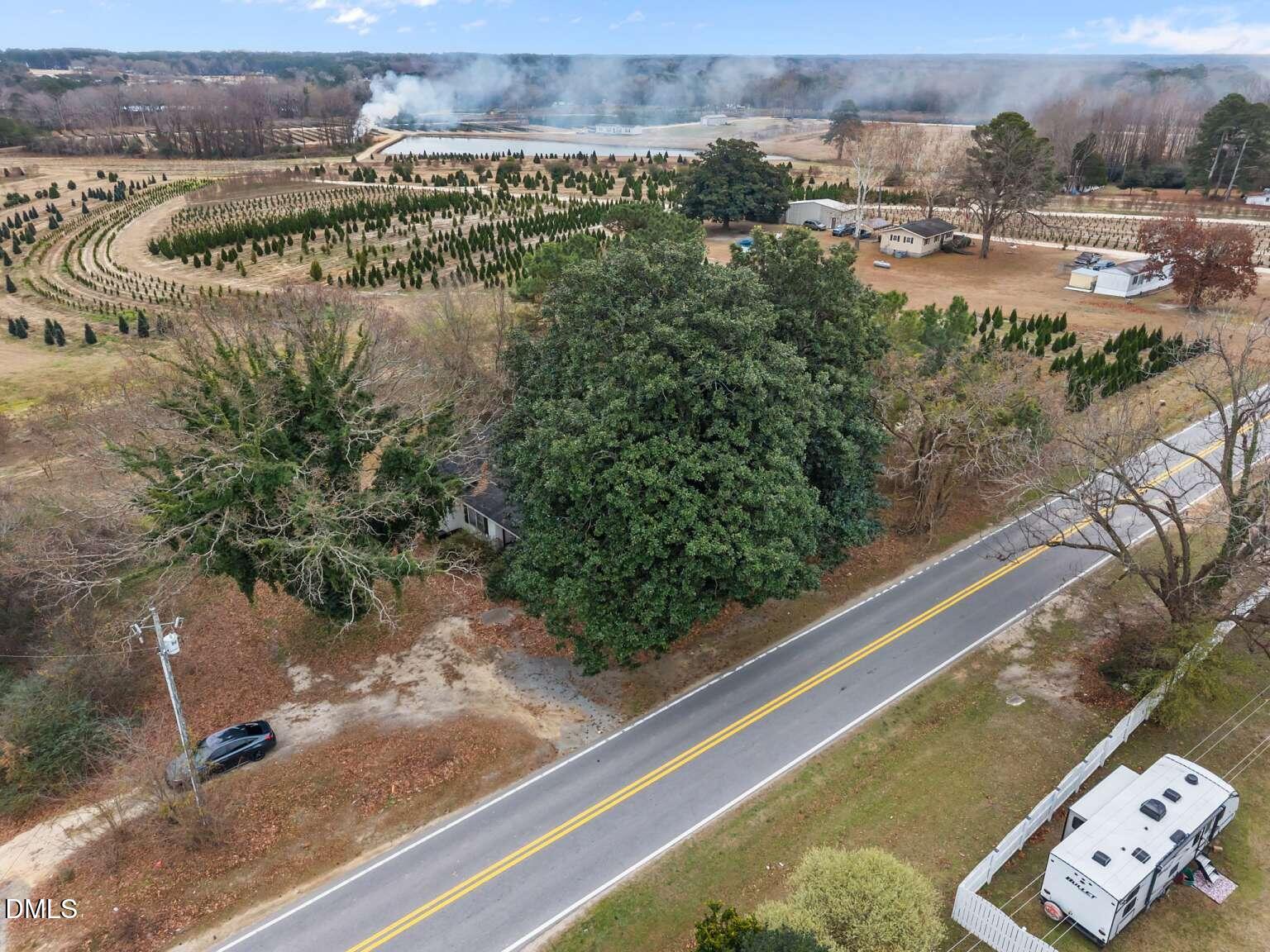 2821 Old Fairground Road Angier, NC 27501 - Photo 32 of 32 an aerial view of residential houses with outdoor space and river