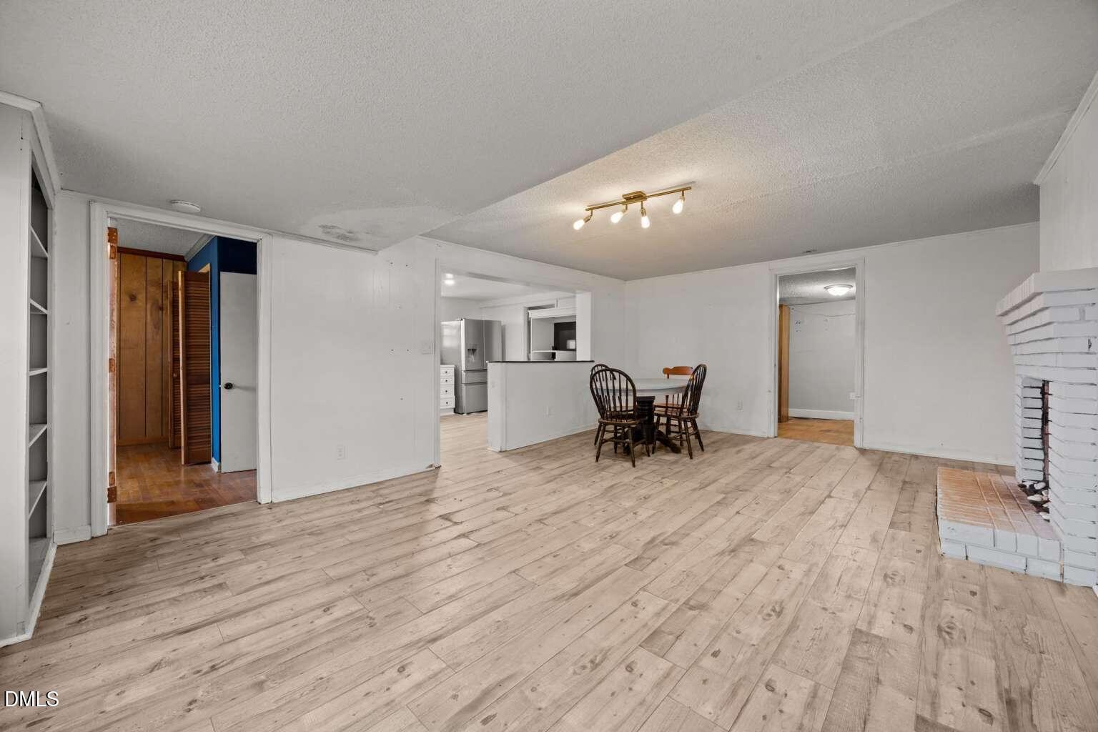 2821 Old Fairground Road Angier, NC 27501 - Photo 7 of 32 a view of a livingroom with furniture and a flat screen tv