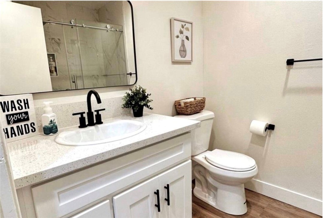 425 Lewis Place Placentia, CA 92870 - Photo 9 of 15 a bathroom with a sink and a toilet