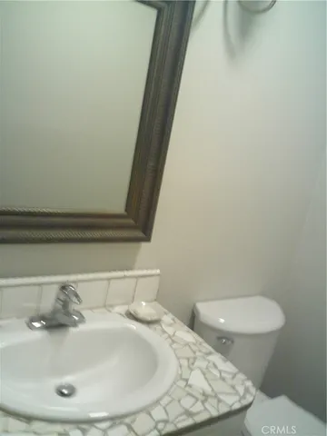 a bathroom with a sink and a toilet