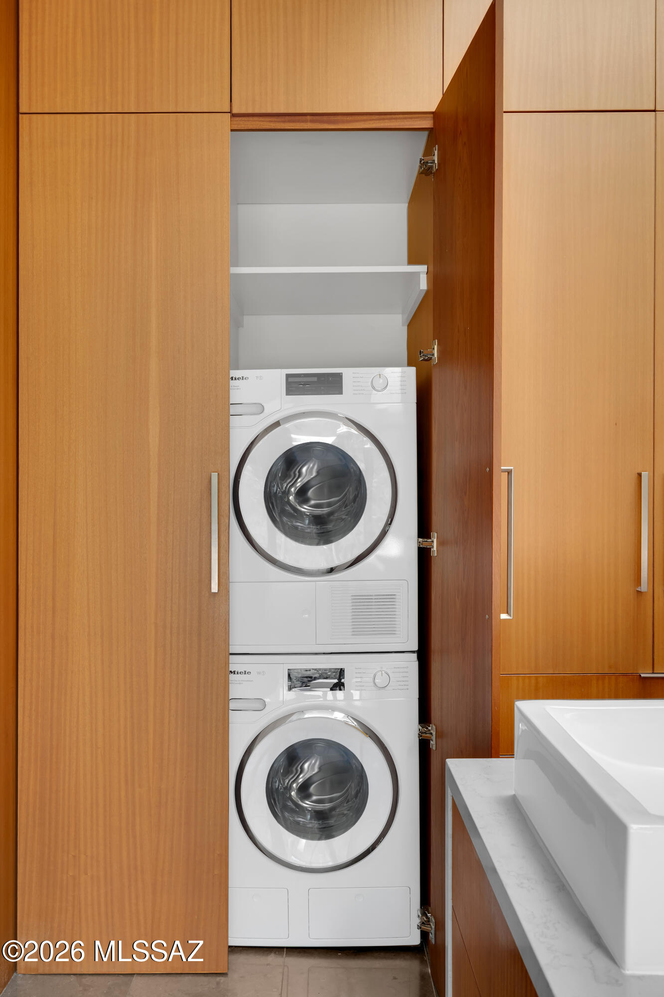 9971 North Silverbell Road Marana, AZ 85653 - Photo 17 of 34 a utility room with dryer and washer