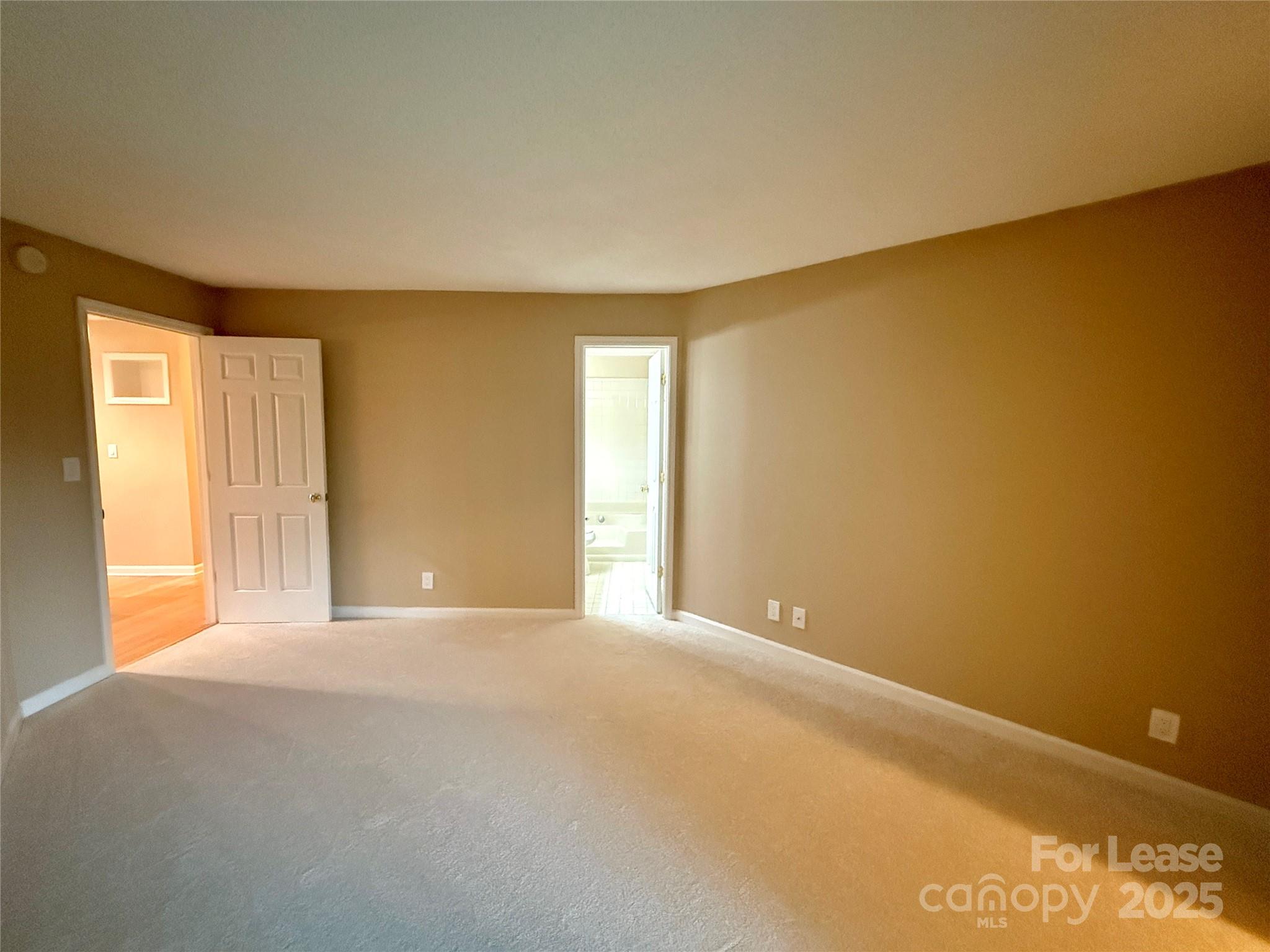 18801 Nautical Drive, Unit 203 Cornelius, NC 28031 - Photo 20 of 28 a view of an empty room with a window