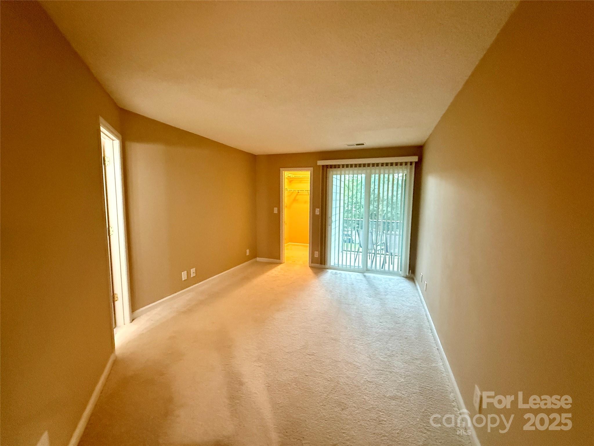18801 Nautical Drive, Unit 203 Cornelius, NC 28031 - Photo 21 of 28 a view of an empty room with a window