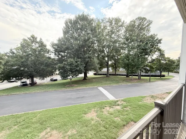 a view of a building with a yard