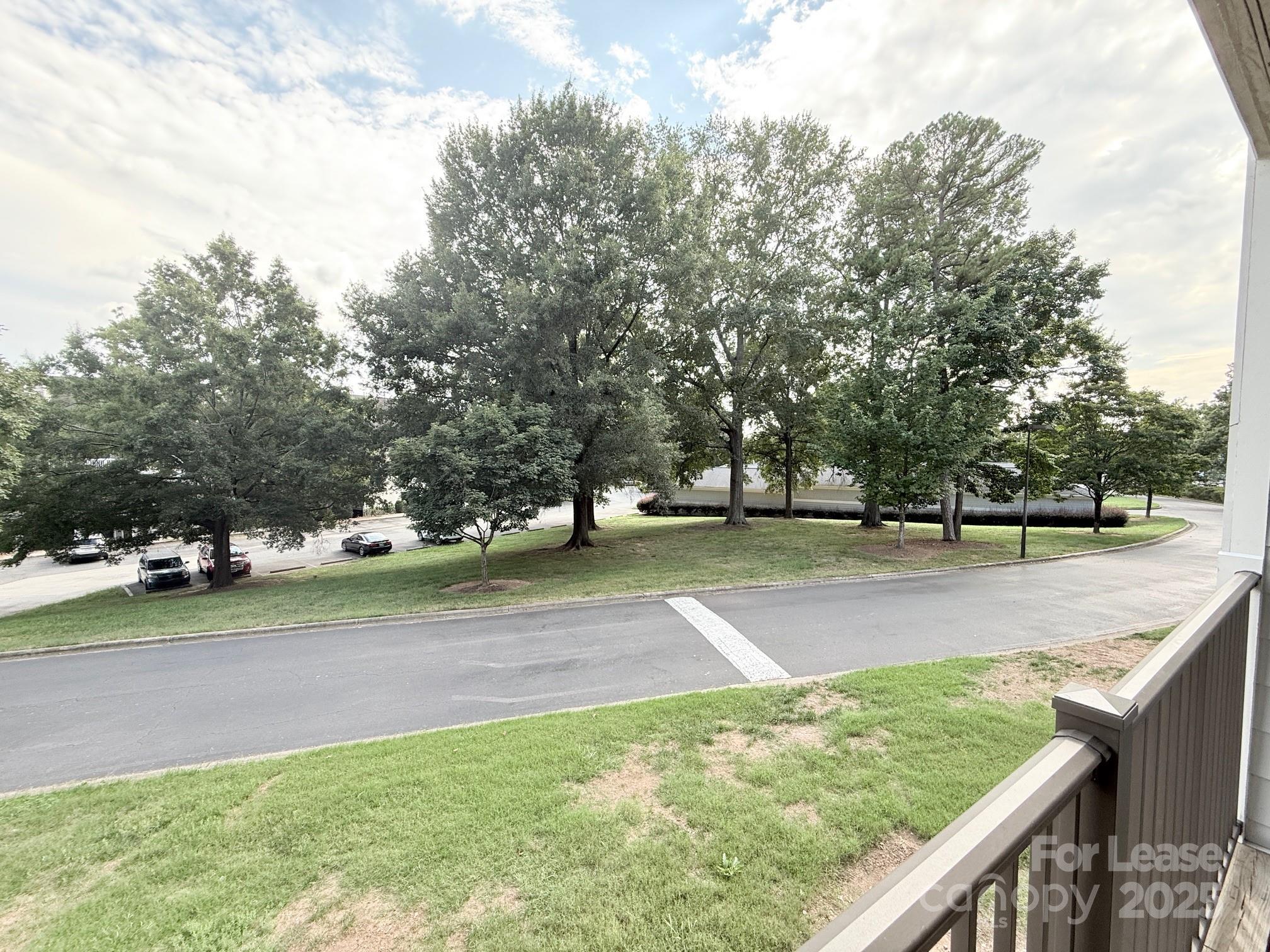 18801 Nautical Drive, Unit 203 Cornelius, NC 28031 - Photo 26 of 28 a view of a yard with trees
