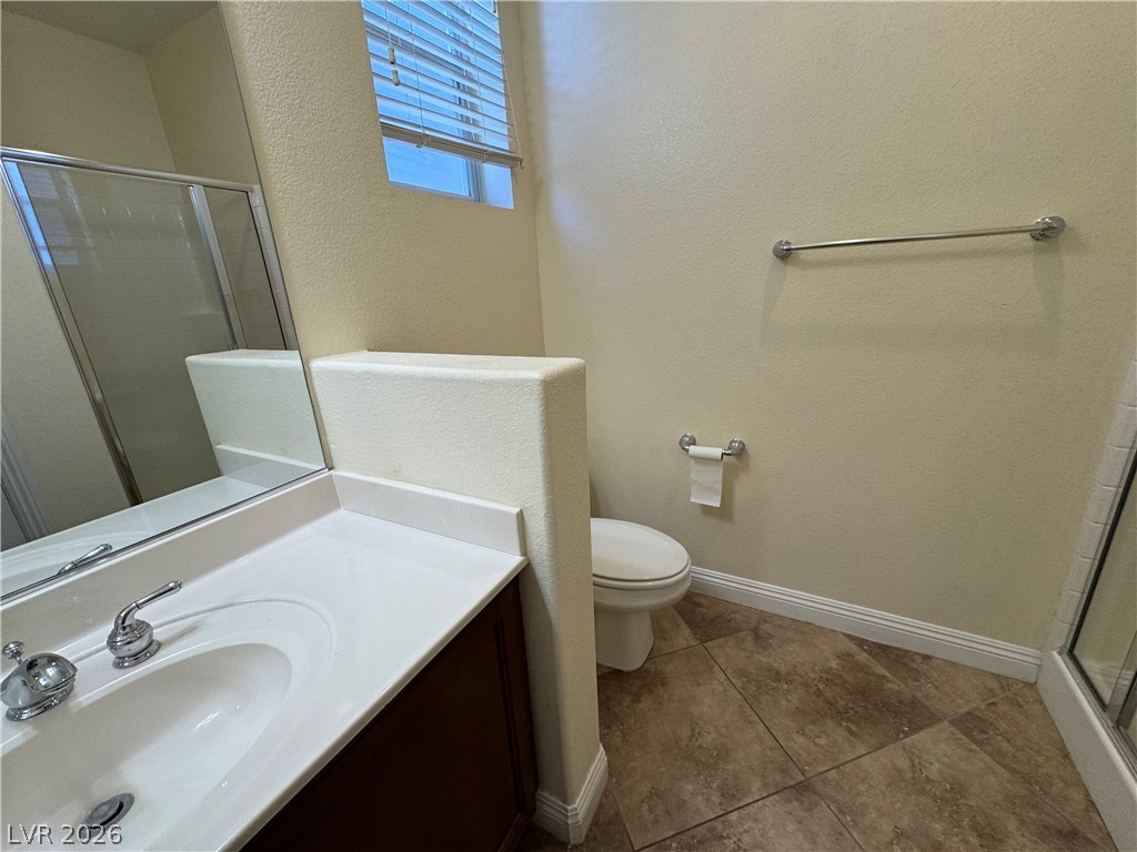 1333 Jamesbury Road Las Vegas, NV 89135 - Photo 5 of 43 A well-appointed bathroom with durable tile flooring and a functional vanity.