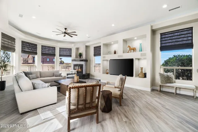 a spacious bathroom with a granite countertop sink mirror and shower