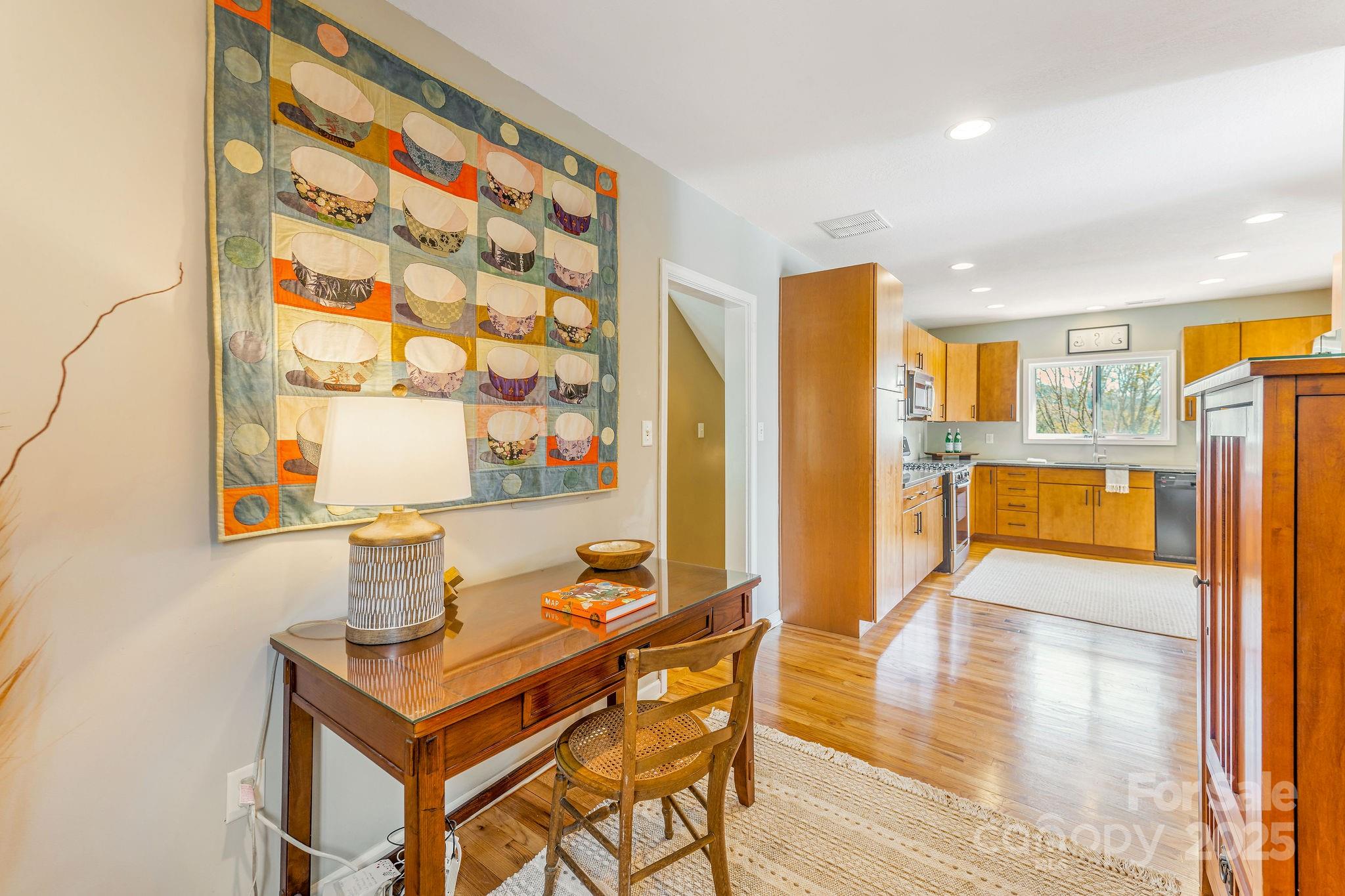 19 Westview Road Asheville, NC 28804 - Photo 17 of 44 a dining room with furniture and wooden floor