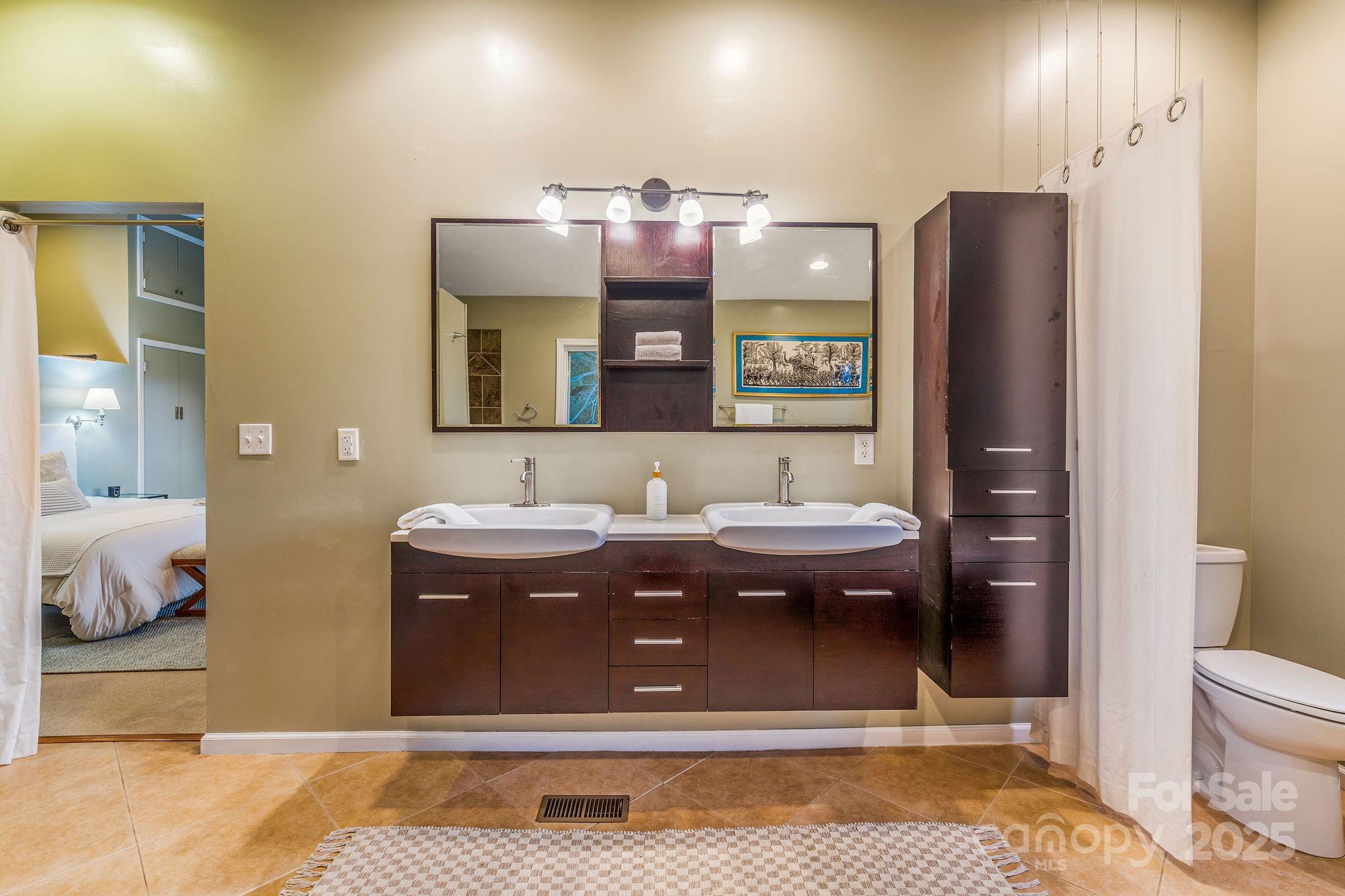 19 Westview Road Asheville, NC 28804 - Photo 31 of 44 a bathroom with a bathtub shower sink and toilet