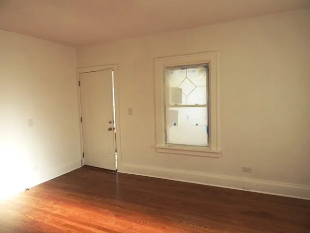 a kitchen with granite countertop a sink stainless steel appliances and cabinets