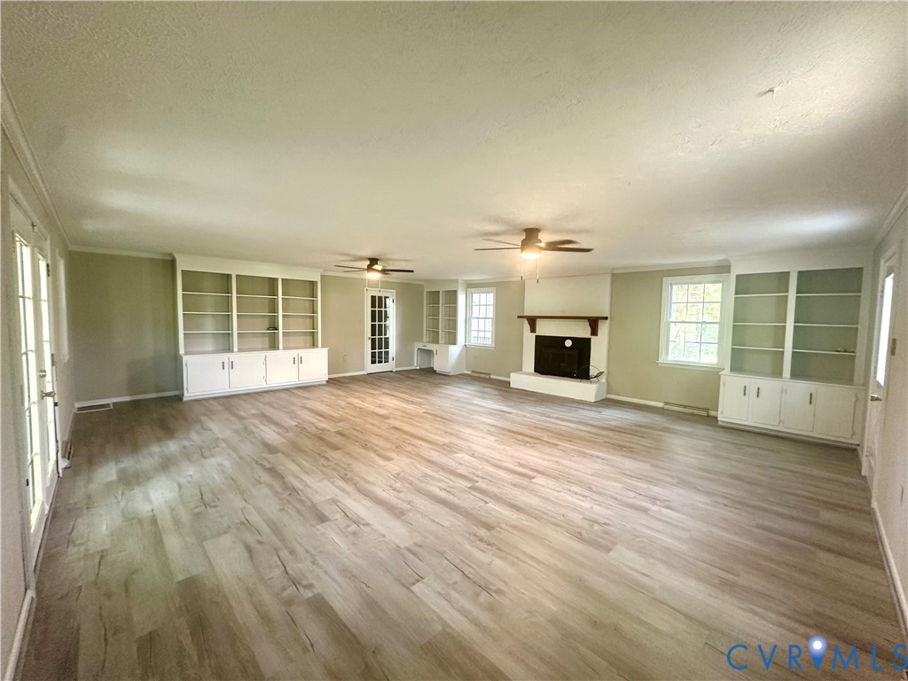 205 Hardtimes Road Farmville, VA 23901 - Photo 24 of 34 Spacious living area featuring wood-finish floorin