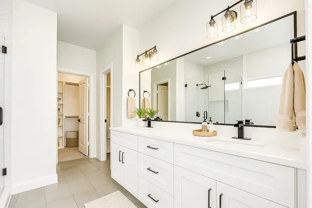 a bathroom with a bathtub and shower