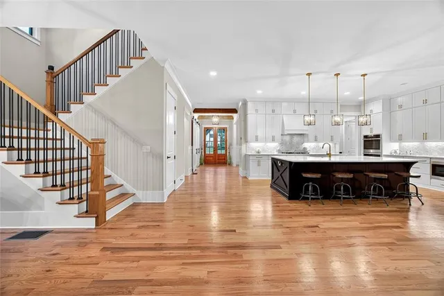a view of kitchen with cabinets and wooden floor