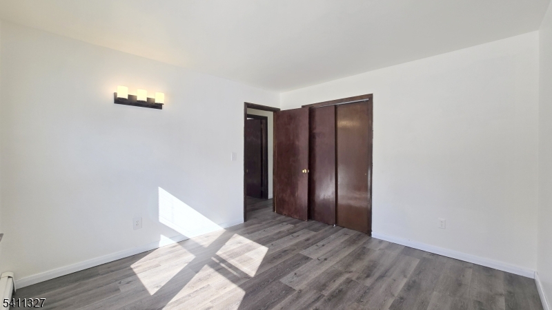 388 Garibaldi Avenue Lodi, NJ 07644 - Photo 12 of 20 a view of an empty room