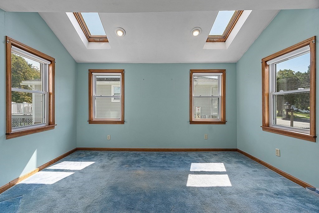 202 Beaconsfield Road Worcester, MA 01602 - Photo 13 of 38 a view of an empty room with a window