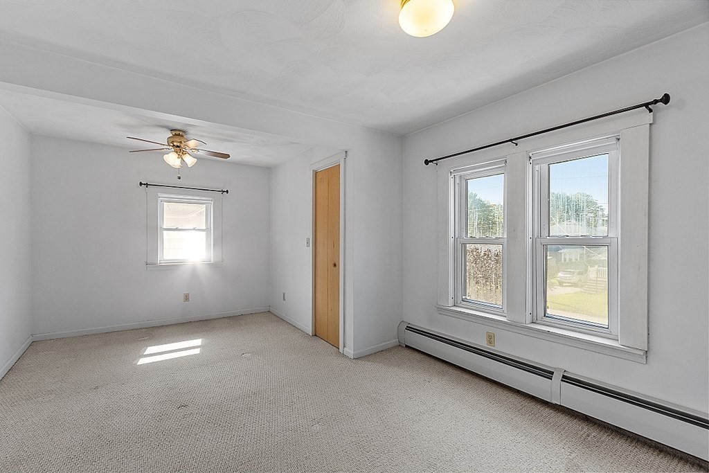 202 Beaconsfield Road Worcester, MA 01602 - Photo 15 of 38 a view of an empty room with a window