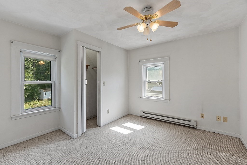 202 Beaconsfield Road Worcester, MA 01602 - Photo 20 of 38 a view of an empty room with a window