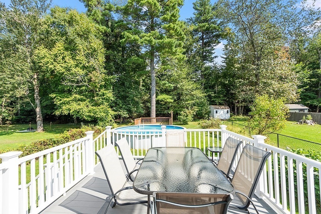 202 Beaconsfield Road Worcester, MA 01602 - Photo 30 of 38 a view of a chair and table on the deck