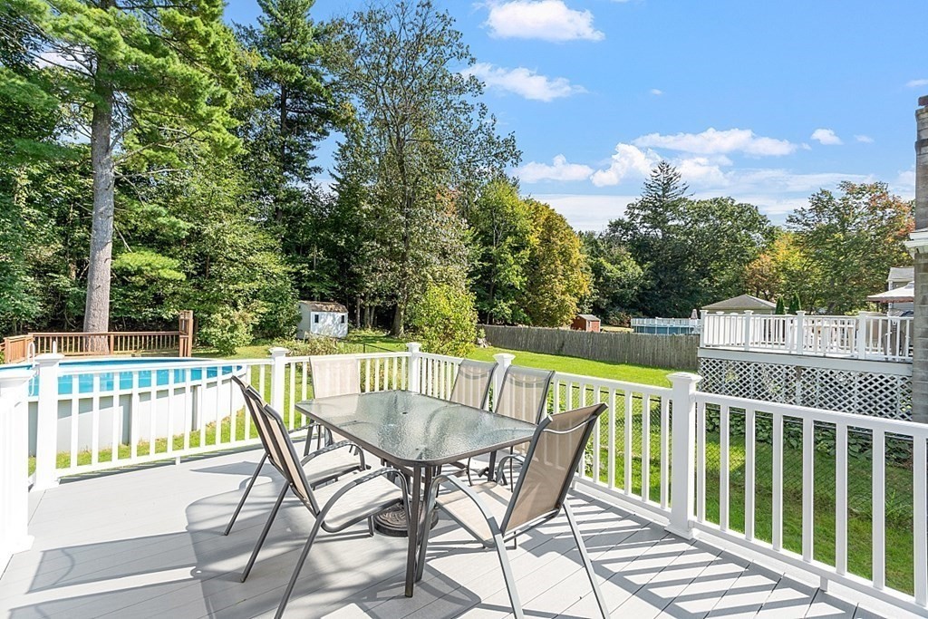 202 Beaconsfield Road Worcester, MA 01602 - Photo 31 of 38 a view of a chair and table on the deck