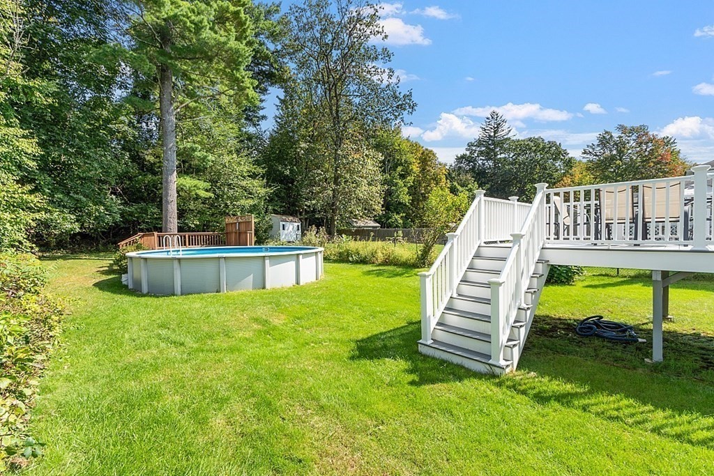 202 Beaconsfield Road Worcester, MA 01602 - Photo 34 of 38 a view of a chair and tables in the back yard