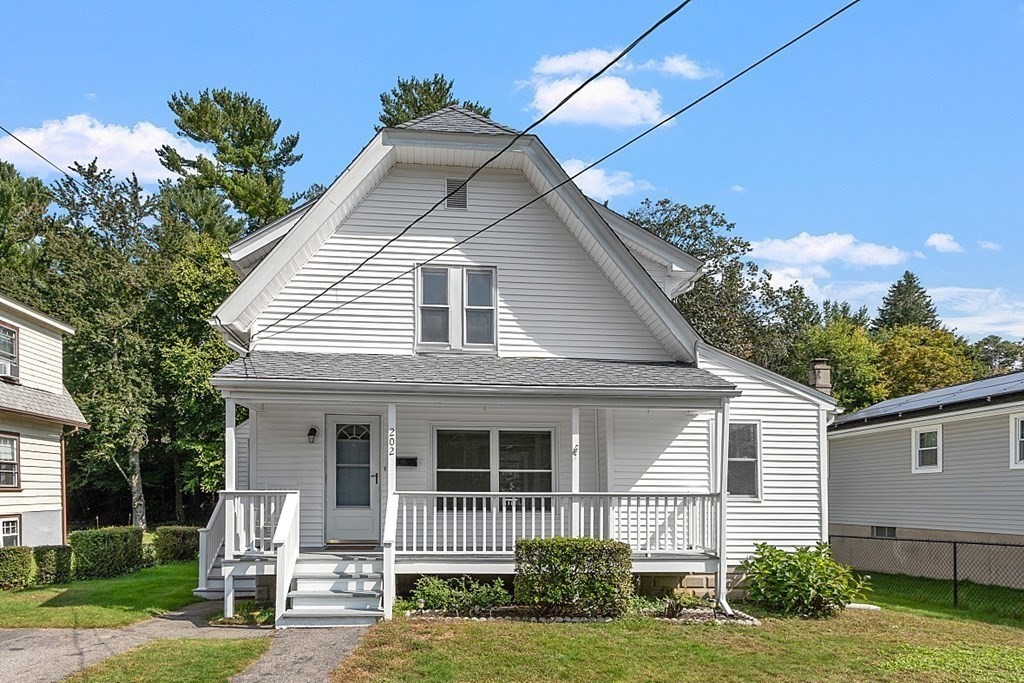 202 Beaconsfield Road Worcester, MA 01602 - Photo 38 of 38 a front view of a house with a yard