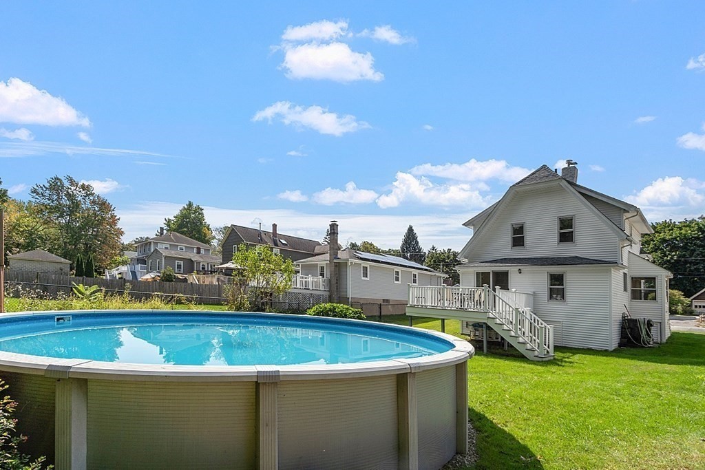 202 Beaconsfield Road Worcester, MA 01602 - Photo 4 of 38 a view of a house with a big yard