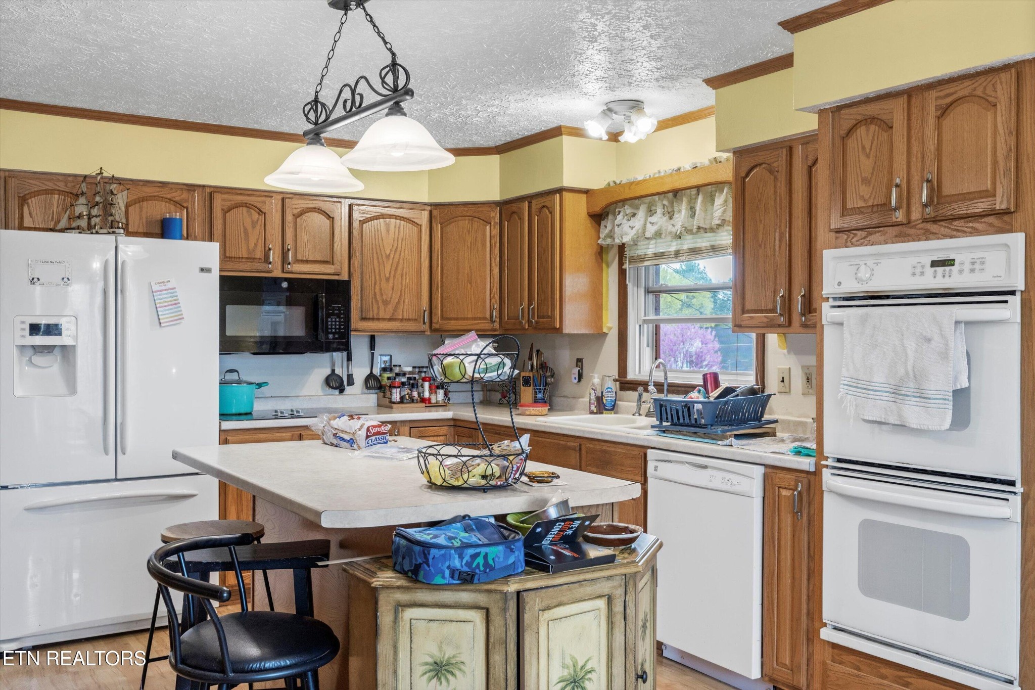 226 Thacker Drive La Follette, TN 37766 - Photo 12 of 51 a open kitchen with stainless steel appliances granite countertop a stove refrigerator and cabinets