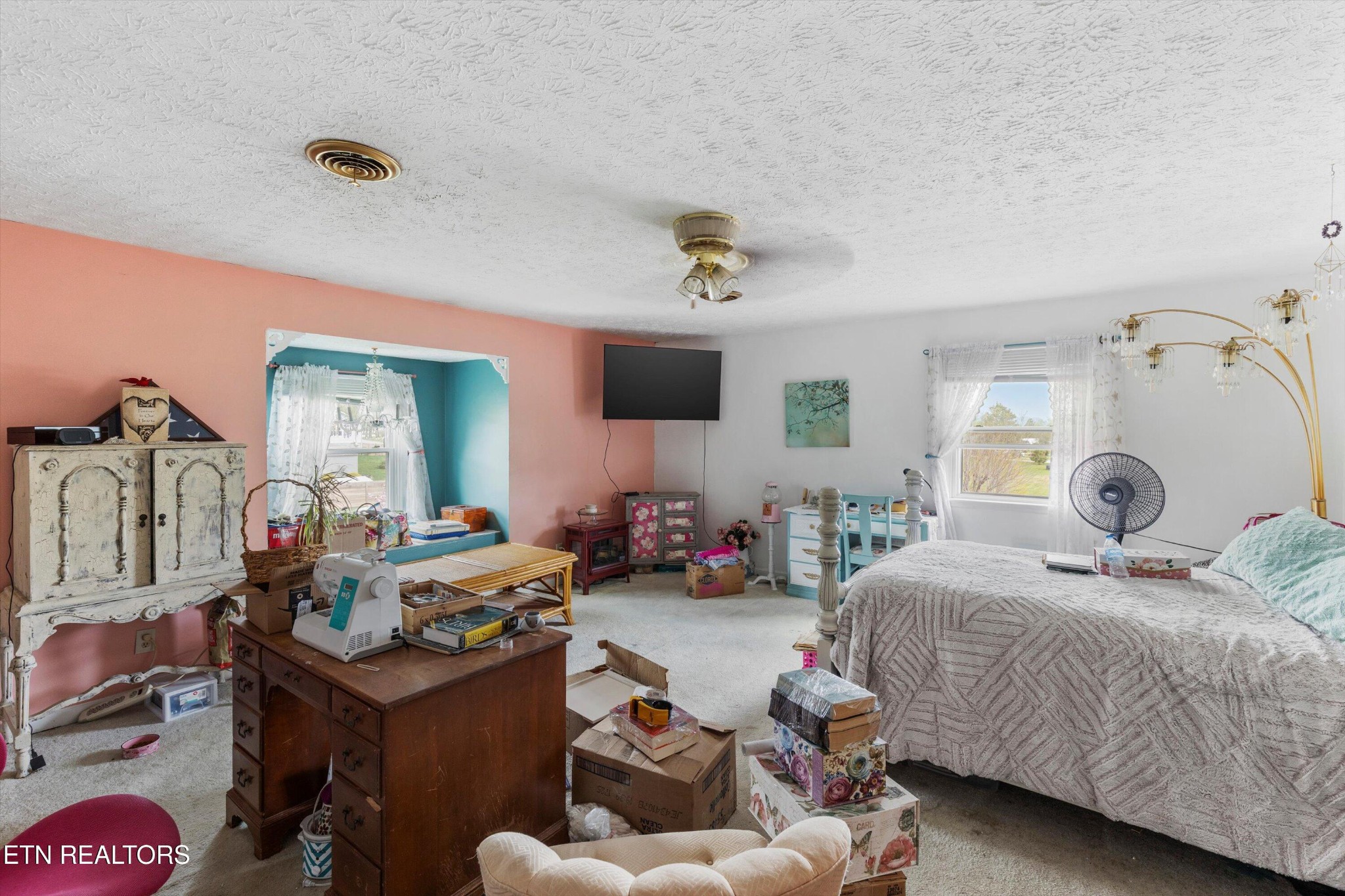 226 Thacker Drive La Follette, TN 37766 - Photo 14 of 51 a bedroom with furniture and a flat screen tv
