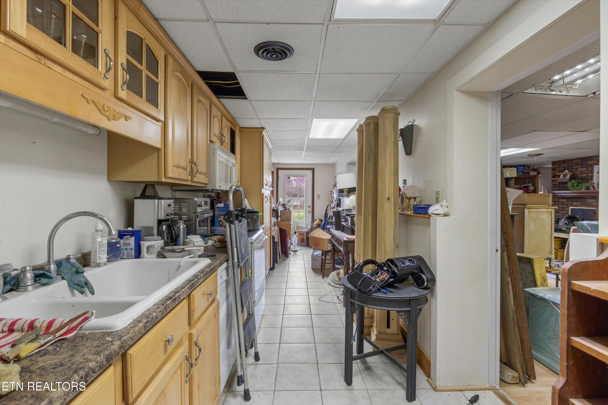 226 Thacker Drive La Follette, TN 37766 - Photo 19 of 51 a kitchen with stainless steel appliances granite countertop a sink a stove and refrigerator