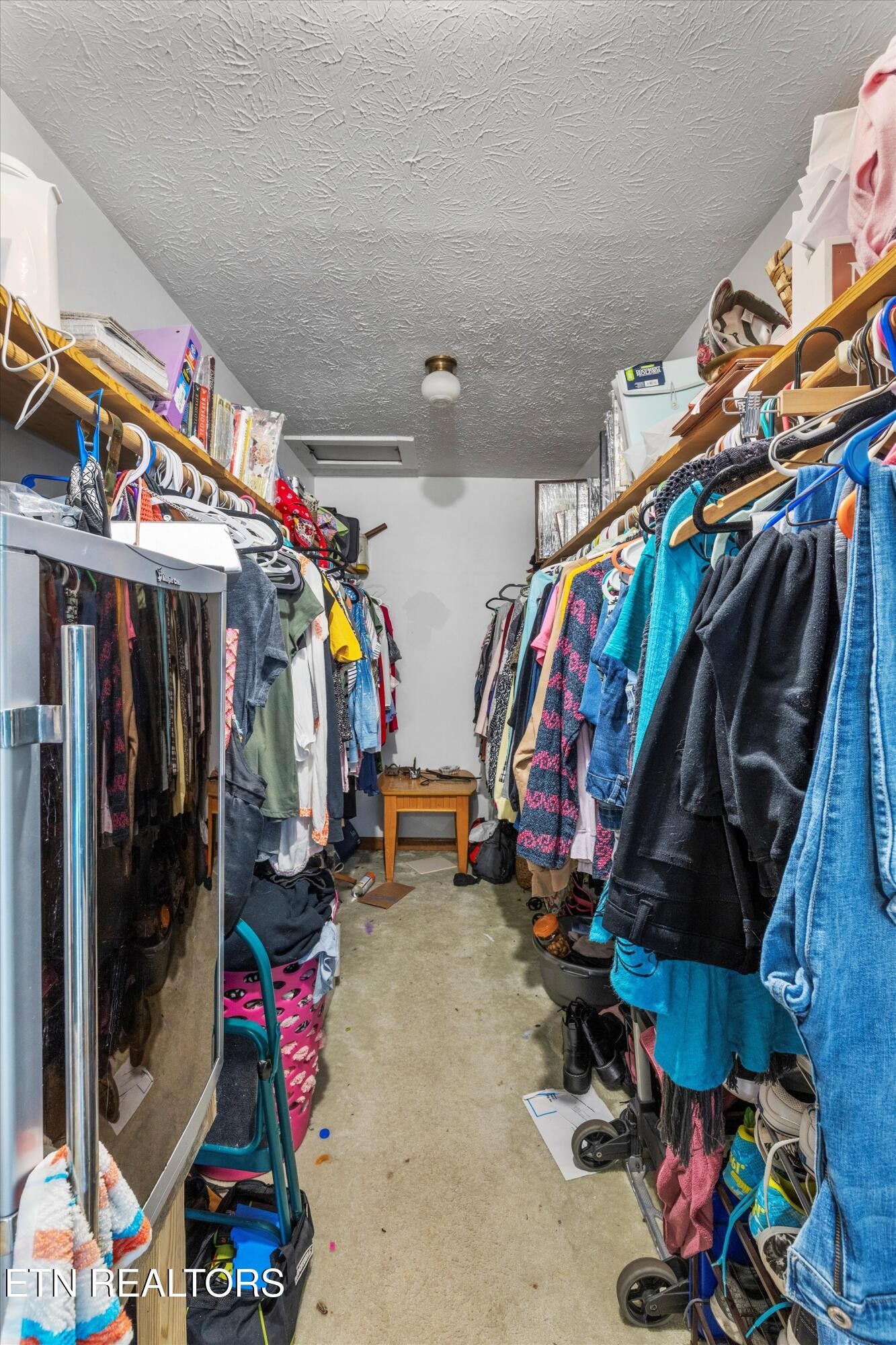 226 Thacker Drive La Follette, TN 37766 - Photo 23 of 51 a view of walk in closet with clothes