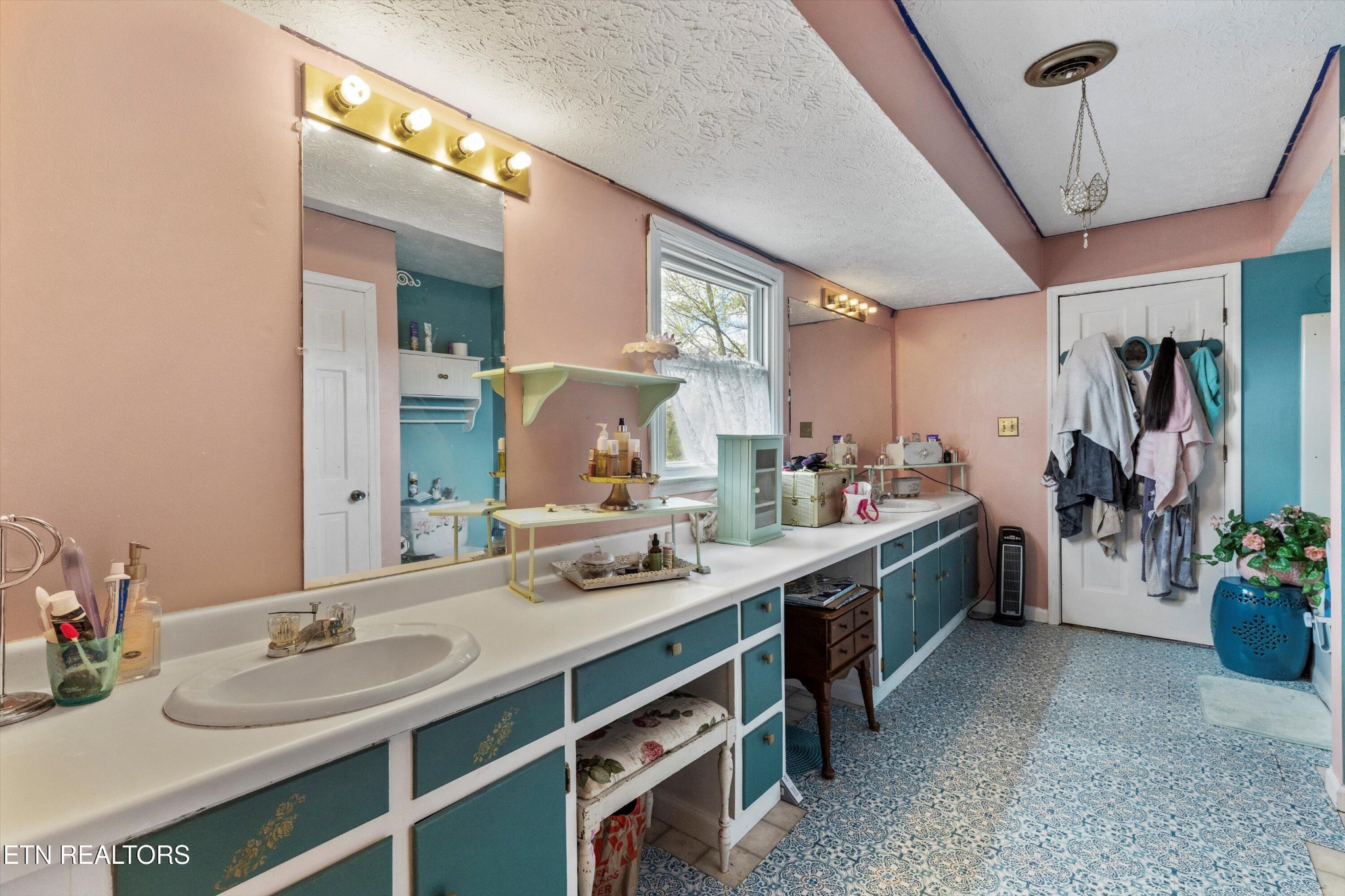226 Thacker Drive La Follette, TN 37766 - Photo 24 of 51 a view of a bathroom with dual sinks