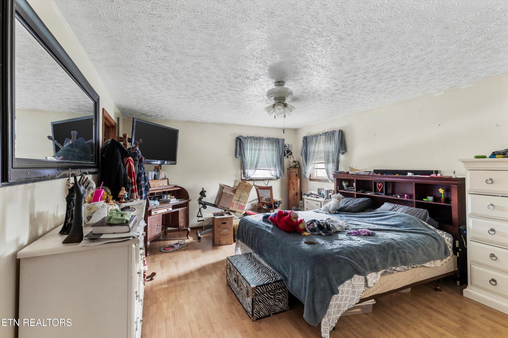 226 Thacker Drive La Follette, TN 37766 - Photo 28 of 51 a bedroom with a bed gym equipment and a window