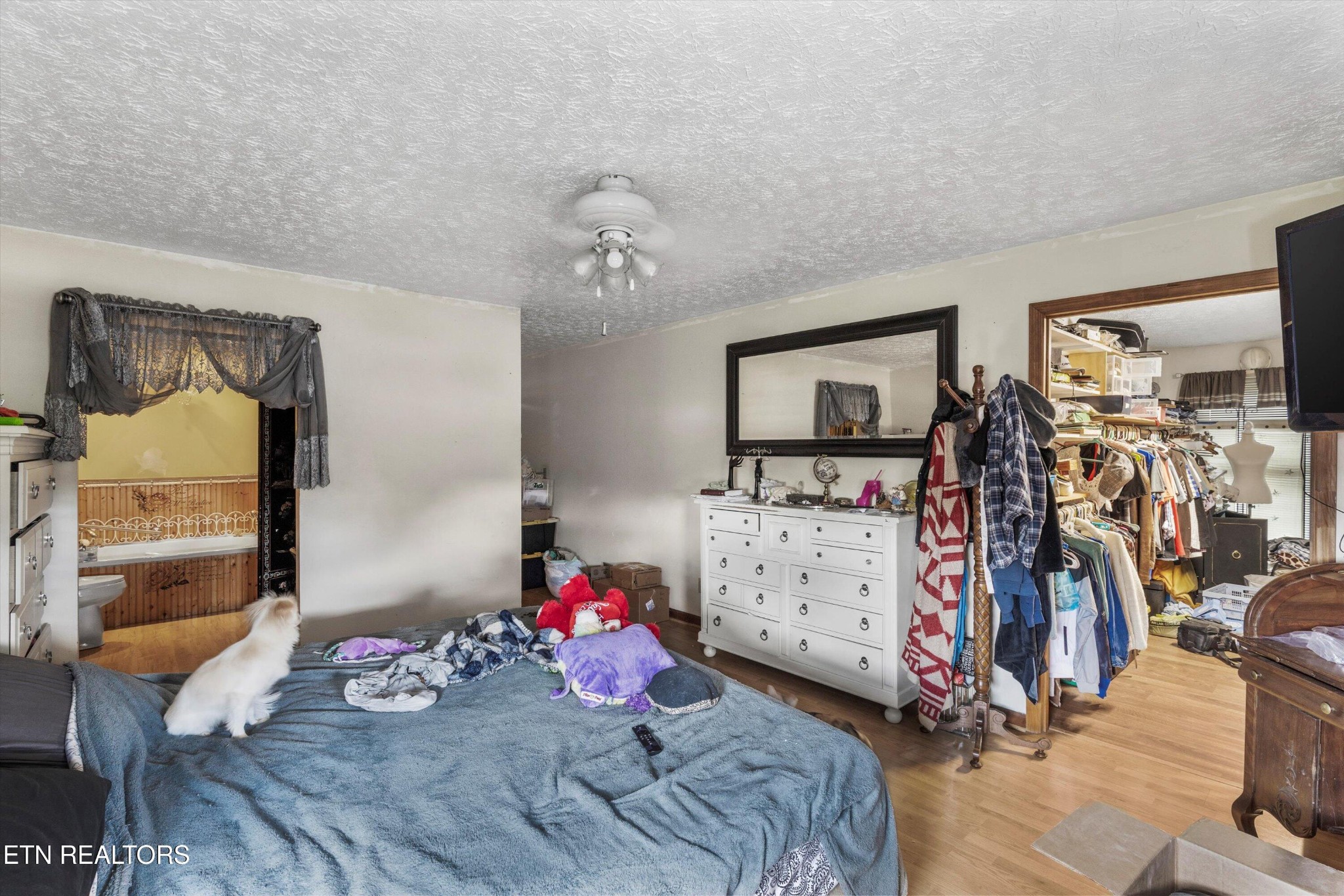 226 Thacker Drive La Follette, TN 37766 - Photo 29 of 51 a bedroom with furniture and a bed