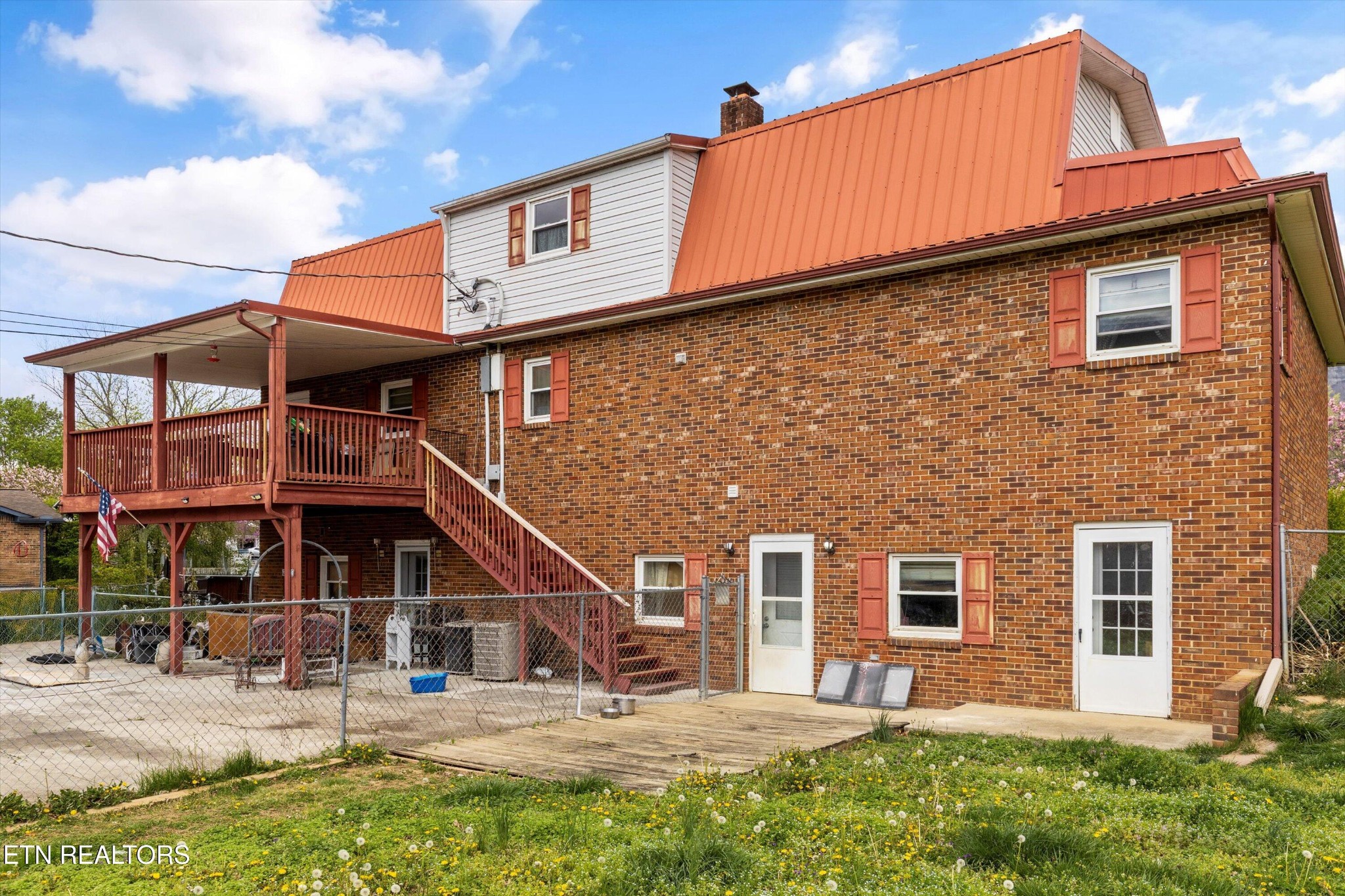 226 Thacker Drive La Follette, TN 37766 - Photo 33 of 51 a front view of a house with a yard