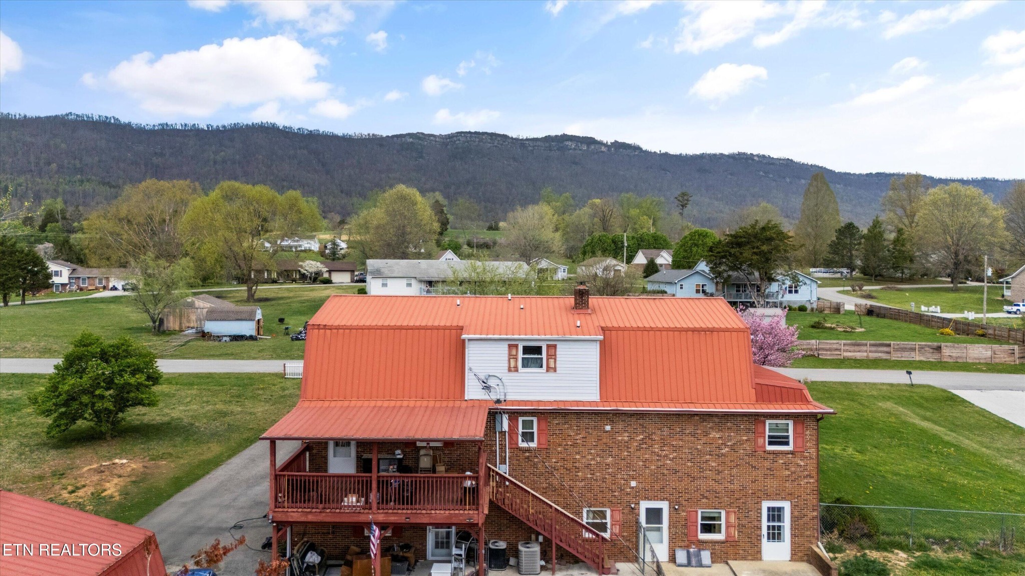 226 Thacker Drive La Follette, TN 37766 - Photo 38 of 51 an aerial view of a house with a yard