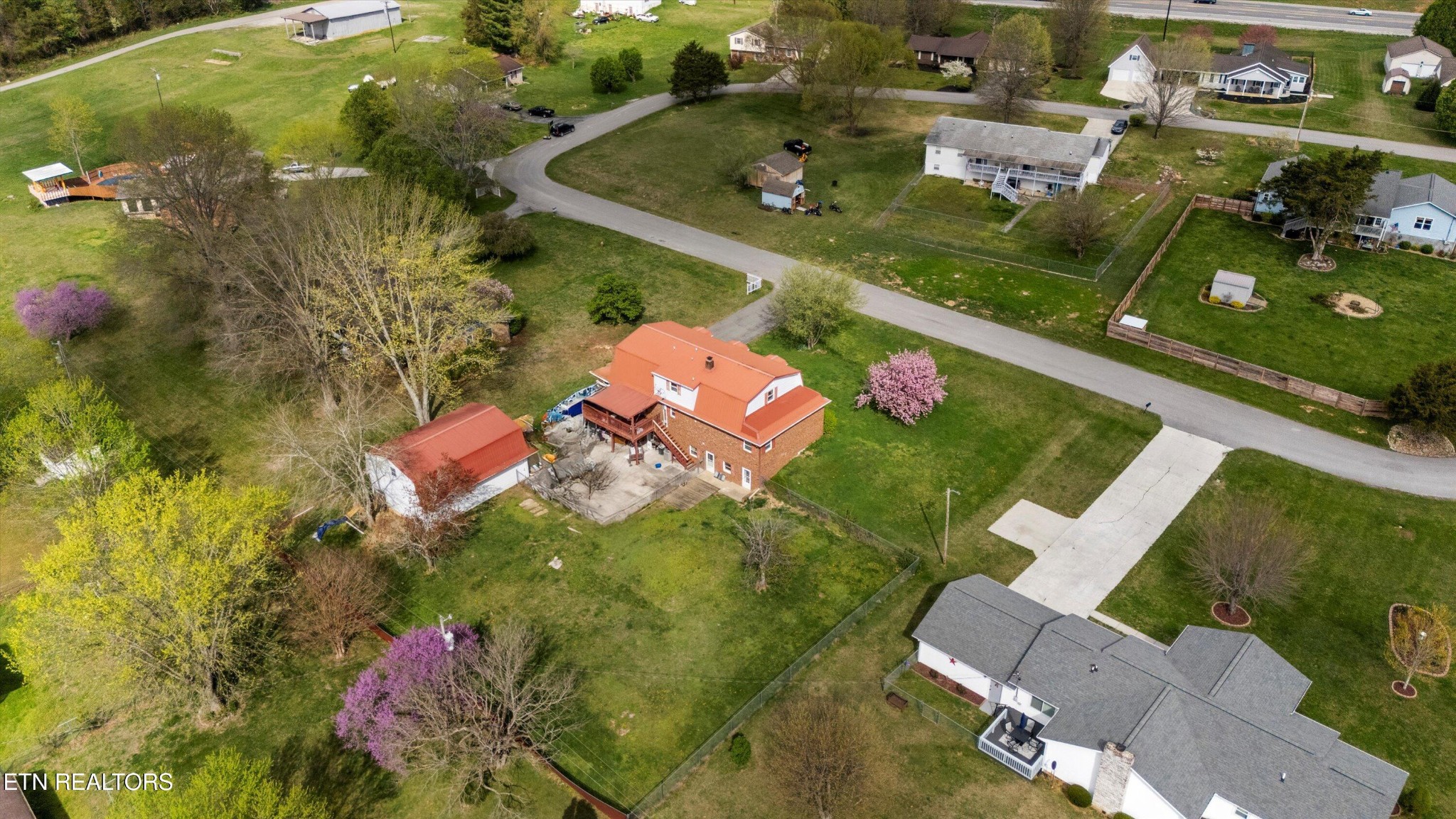 226 Thacker Drive La Follette, TN 37766 - Photo 45 of 51 an aerial view of residential houses with outdoor space