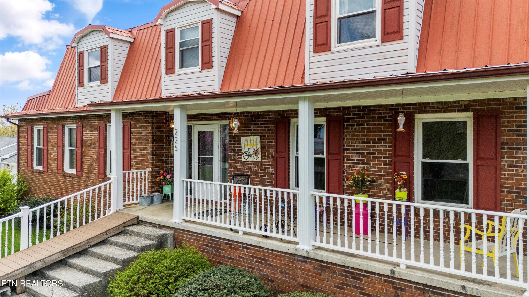226 Thacker Drive La Follette, TN 37766 - Photo 6 of 51 a view of a brick house with a window