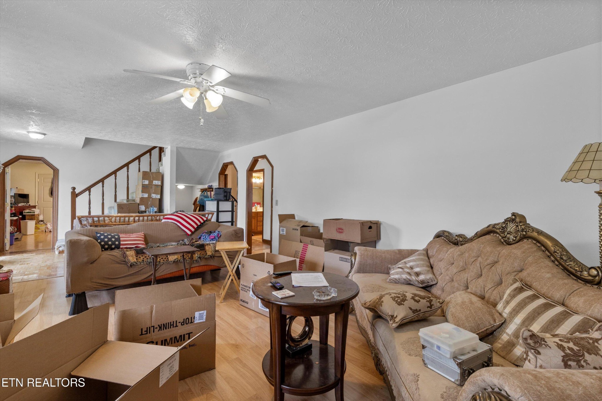 226 Thacker Drive La Follette, TN 37766 - Photo 9 of 51 a living room with furniture a rug and white walls