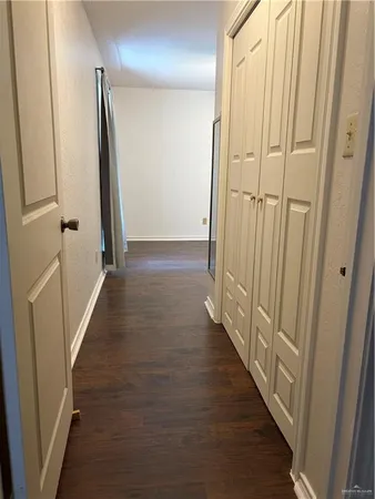 a bathroom with a toilet a sink and a mirror