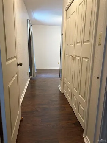 a bathroom with a toilet a sink and a mirror