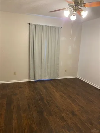 a view of workspace with furniture and a window