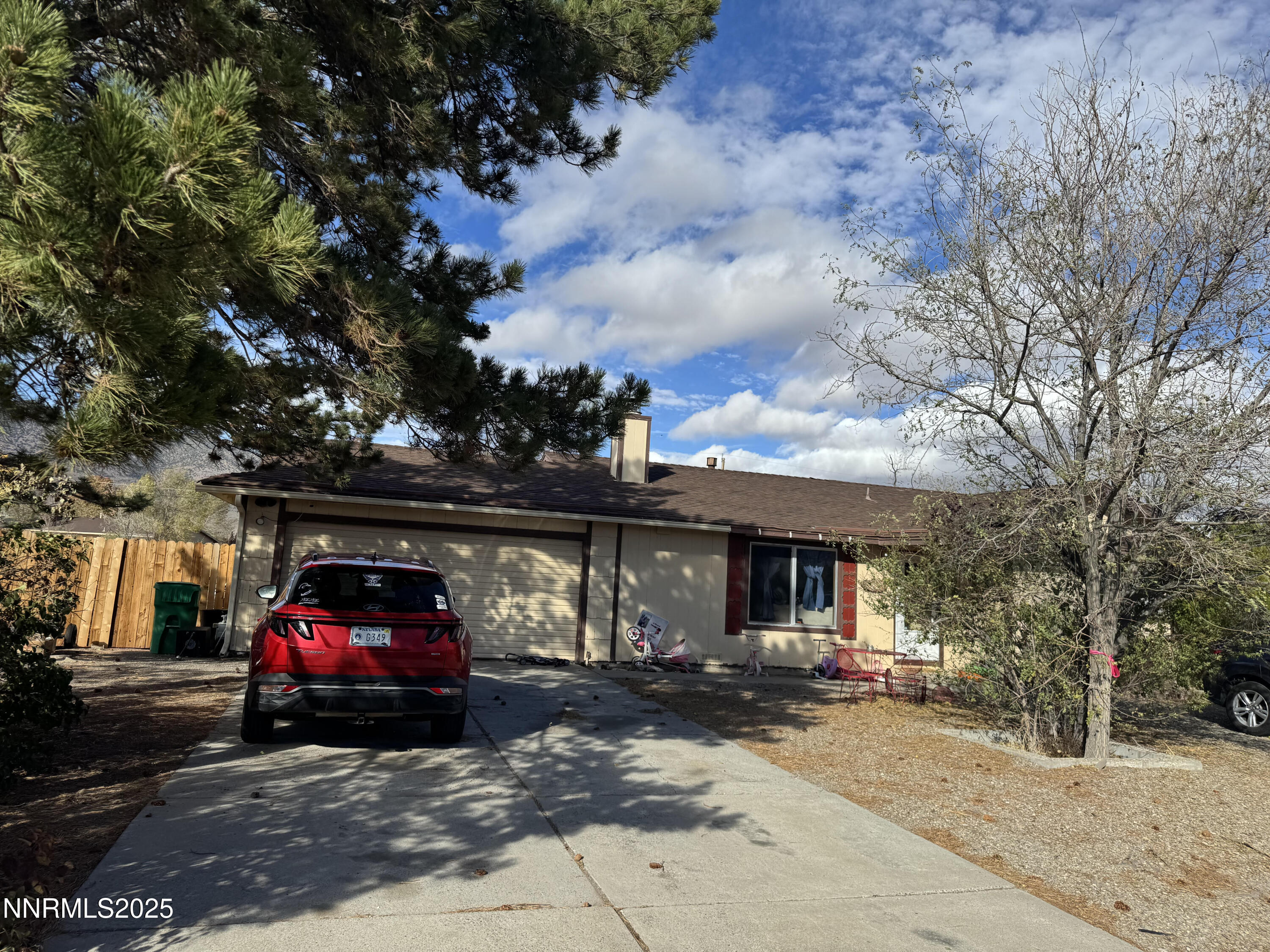 237 Ring Road Dayton, NV 89403 - Photo 1 of 1 a view of a car park in front of the house