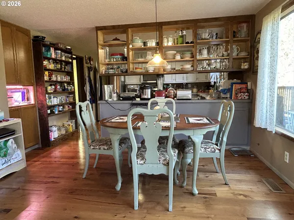 a view of a dining room with furniture