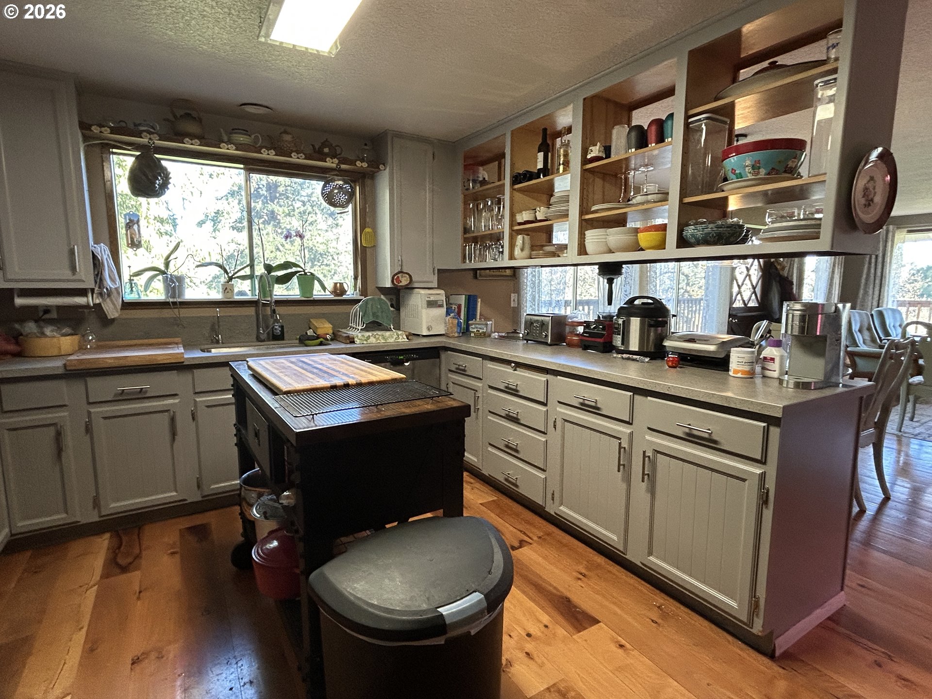 5383 Sunshine Road Roseburg, OR 97470 - Photo 14 of 47 a kitchen with a sink appliances and cabinets