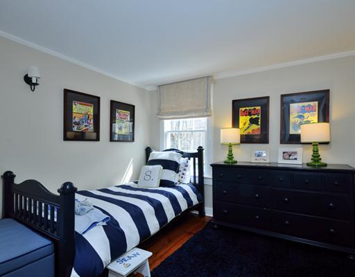 334 Hollow Tree Ridge Road Darien, CT 06820 - Photo 16 of 20 a bedroom with a bed and a dresser in it