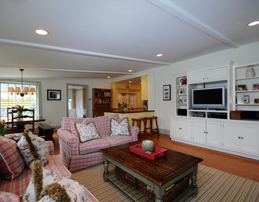 334 Hollow Tree Ridge Road Darien, CT 06820 - Photo 10 of 20 a living room with furniture and a flat screen tv